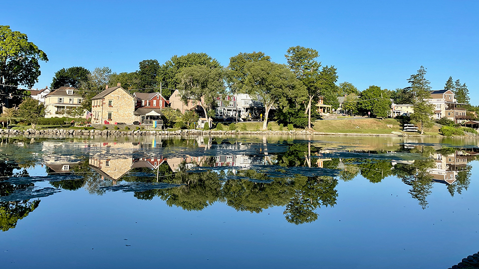 View of Children's Lake and several historic buildings in the Historic District